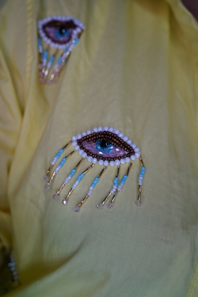 
            
                Load image into Gallery viewer, EVIL EYE BUTTON DRESS
            
        