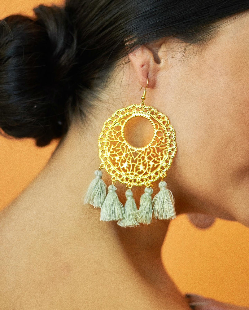 
            
                Load image into Gallery viewer, GOLD/GRAY POM POM EARRINGS
            
        